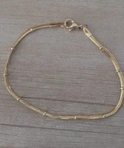 pulsera de acero dorado