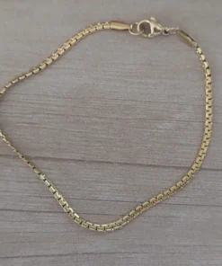 pulseras de acero dorada plana