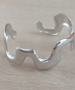 Esclava regulable de acero en forma irregular