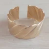 Esclava regulable de acero dorado chunky
