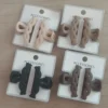 Broches con forma de trenza