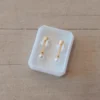 Abridor acero dorado perla