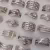 ANILLOS DE ACERO VARIOS STRASS X 36 UNIDADES SURTIDOS EN MEDIDAS Y MODELOS. (MEDIDAS DEL 18 AL 21)