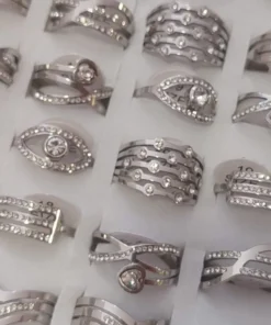 ANILLOS DE ACERO VARIOS STRASS X 36 UNIDADES SURTIDOS EN MEDIDAS Y MODELOS. (MEDIDAS DEL 18 AL 21)