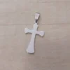 Dije de acero cruz