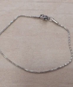 PULSERA DE ACERO VENECIANA RETORCIDA. LARGO 19 CM.