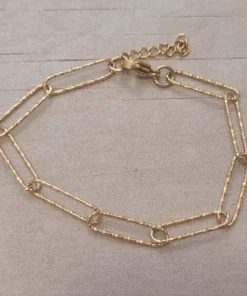 PULSERA DE ACERO DORADO ESLABÓN ALARGADO FACETADO. LARGO 17,5 + 2,5  CM.
