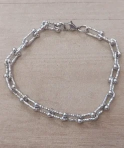 Pulsera de acero trabajada