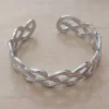 PULSERA DE ACERO ESCLAVA ABIERTA TRABAJADA