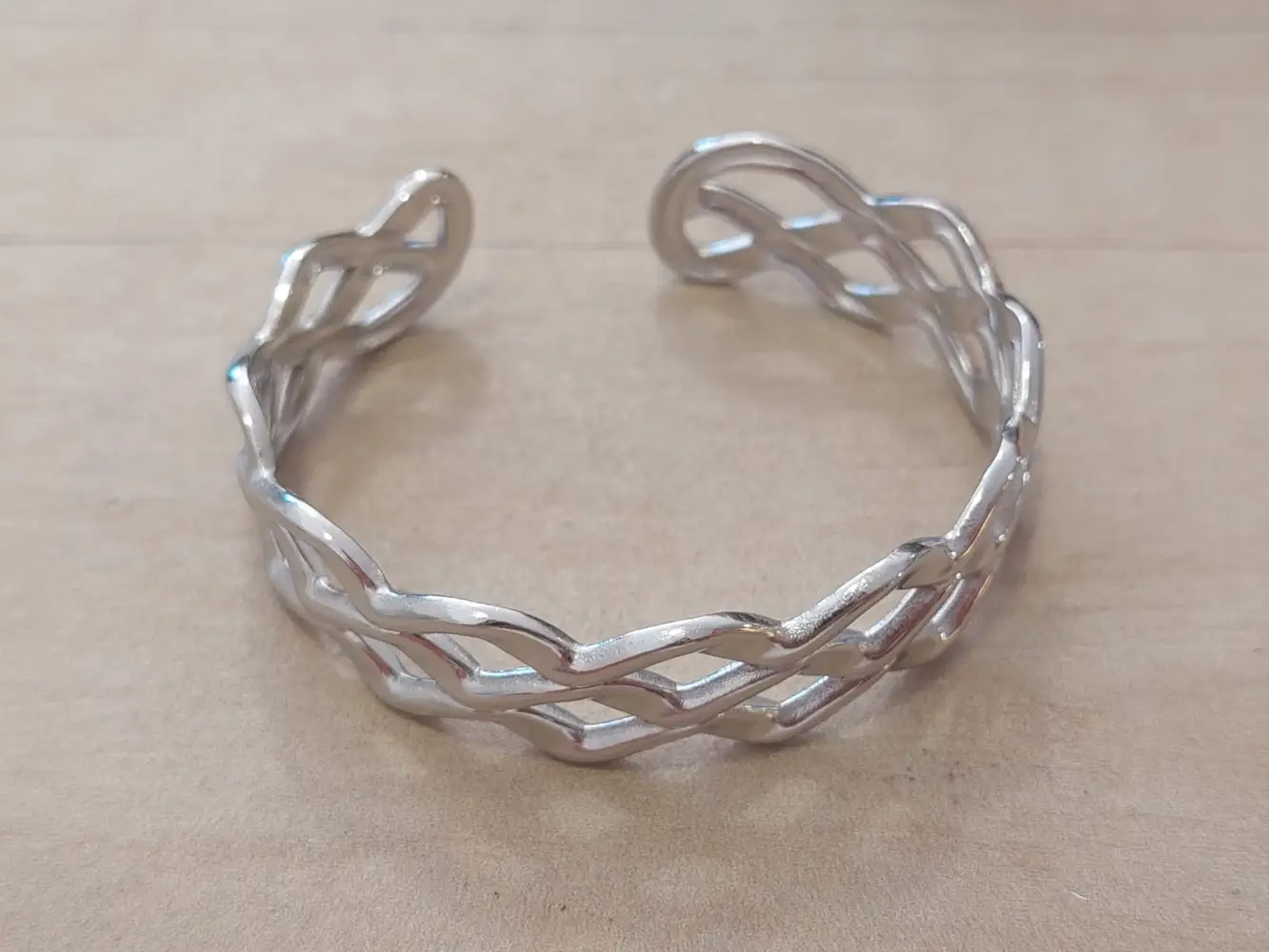PULSERA DE ACERO ESCLAVA ABIERTA TRABAJADA