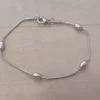 PULSERA DE ACERO COLA DE RATÓN 1.2 MM CON BOLITAS OVALADAS. LARGO 17,5 CM