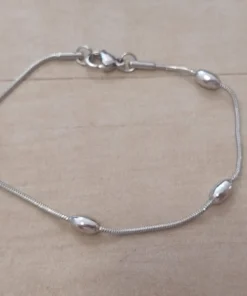 PULSERA DE ACERO COLA DE RATÓN 1.2 MM CON BOLITAS OVALADAS. LARGO 17,5 CM