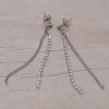 Aro de acero pasante con cadena y tira de strass blanco colgantes