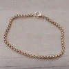 Pulsera de acero dorado rolo cuadrada