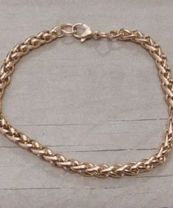 Pulsera de acero dorado espiga