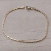 Pulsera de acero dorado cardano