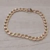 Pulsera de acero dorado grumet