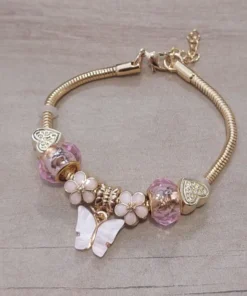 Pulsera de acero dorado con dijes y estrellas colgantes