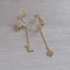 Aro de acero dorado pasante luna con strass y cadena con dije colgante