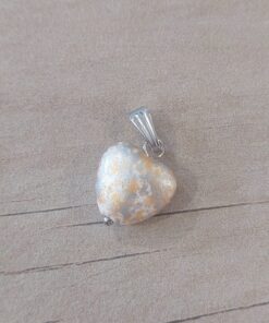 Dije de acero corazón