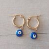 ARO DE ACERO DORADO ARGOLLA 14 MM CON OJO TURCO AZUL 8 MM