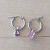 ARO DE ACERO ARGOLLA 15 MM CON BOCA DE STRASS FUCSIA