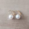 ARO DE ACERO DORADO BRISURA CON PERLA BLANCA PEGADA 9 MM