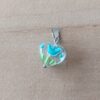 DIJE DE ACERO CORAZON VITROFUSION CON TULIPAN RESINADO TURQUESA. MEDIDA 10 X 15  MM