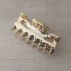 PACK X 12 BROCHES DE PLASTICO DORADO. TAMAÑO 60 X 25 MM