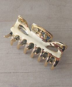 PACK X 12 BROCHES DE PLASTICO DORADO. TAMAÑO 60 X 25 MM