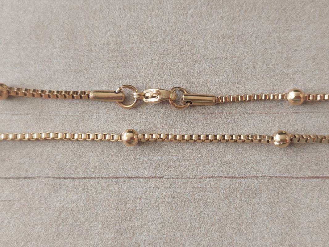 CADENA DE ACERO DORADO VENECIANA 1.9 CON BOLITA