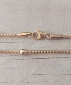 CADENA DE ACERO DORADO MALLA TUBULAR CON BOLITAS INTERCALADAS DE 4 MM