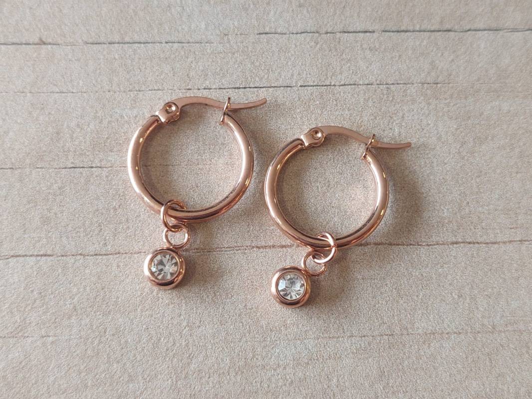 ARO ARGOLLA 15 MM DE ACERO ROSÉ CON DIJE SUSANITO