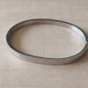 PULSERA DE ACERO ESCLAVA OVALADA CON BISAGRA 4 MM.