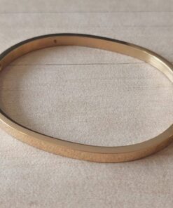 PULSERA DE ACERO DORADO ESCLAVA OVALADA CON BISAGRA 4 MM.