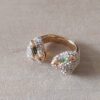 ANILLO DE ACERO DORADO ANILLO DE ACERO DORADO DOBLE TIGRE DOBLE ABIERTO CON STRASS BLANCO Y OJOS VERDES
