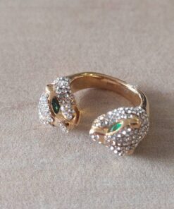 ANILLO DE ACERO DORADO ANILLO DE ACERO DORADO DOBLE TIGRE DOBLE ABIERTO CON STRASS BLANCO Y OJOS VERDES