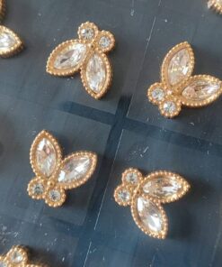 BLISTER DE AROS DE ACERO DORADO MARIPOSA CON STRASS X 12 PARES.