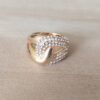ANILLO DE ACERO DORADO INFINITO COMBINADO CON STRASS BLANCO