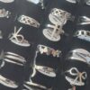 ANILLOS DE ACERO FIGURAS CALADAS X 36 UNIDADES SURTIDOS EN MEDIDAS. (MEDIDAS DEL 16 AL 20)