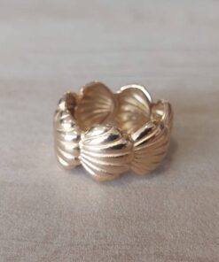 ANILLO ACERO DORADO OSTRA SIN FIN