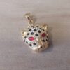 DIJE DE ACERO DORADO TIGRE CON STRASS 25 X 45 MM