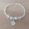 PULSERA DE ACERO BLANCO COLA DE RATÓN 3 MM CON DONAS GAMA CRISTAL Y MARGARITA. LARGO 19 CM