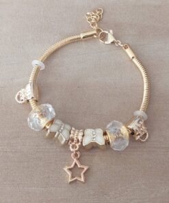 PULSERA DE ACERO DORADO COLA DE RATÓN 3 MM CON DONAS GAMA BEIGE Y ESTRELLA. LARGO 19 CM EXT. 3 CM