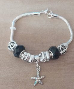 PULSERA DE ACERO BLANCO COLA DE RATÓN 3 MM CON DONAS GAMA NEGRO Y ESTRELLA DE MAR. LARGO 19 CM