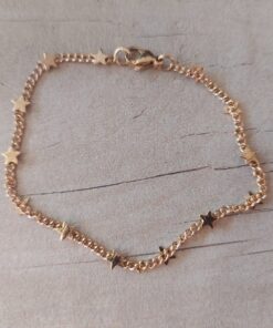 PULSERA DE ACERO DORADO GRUMET CON ESTRELLAS SOLDADAS. LARGO 18,5 CM.