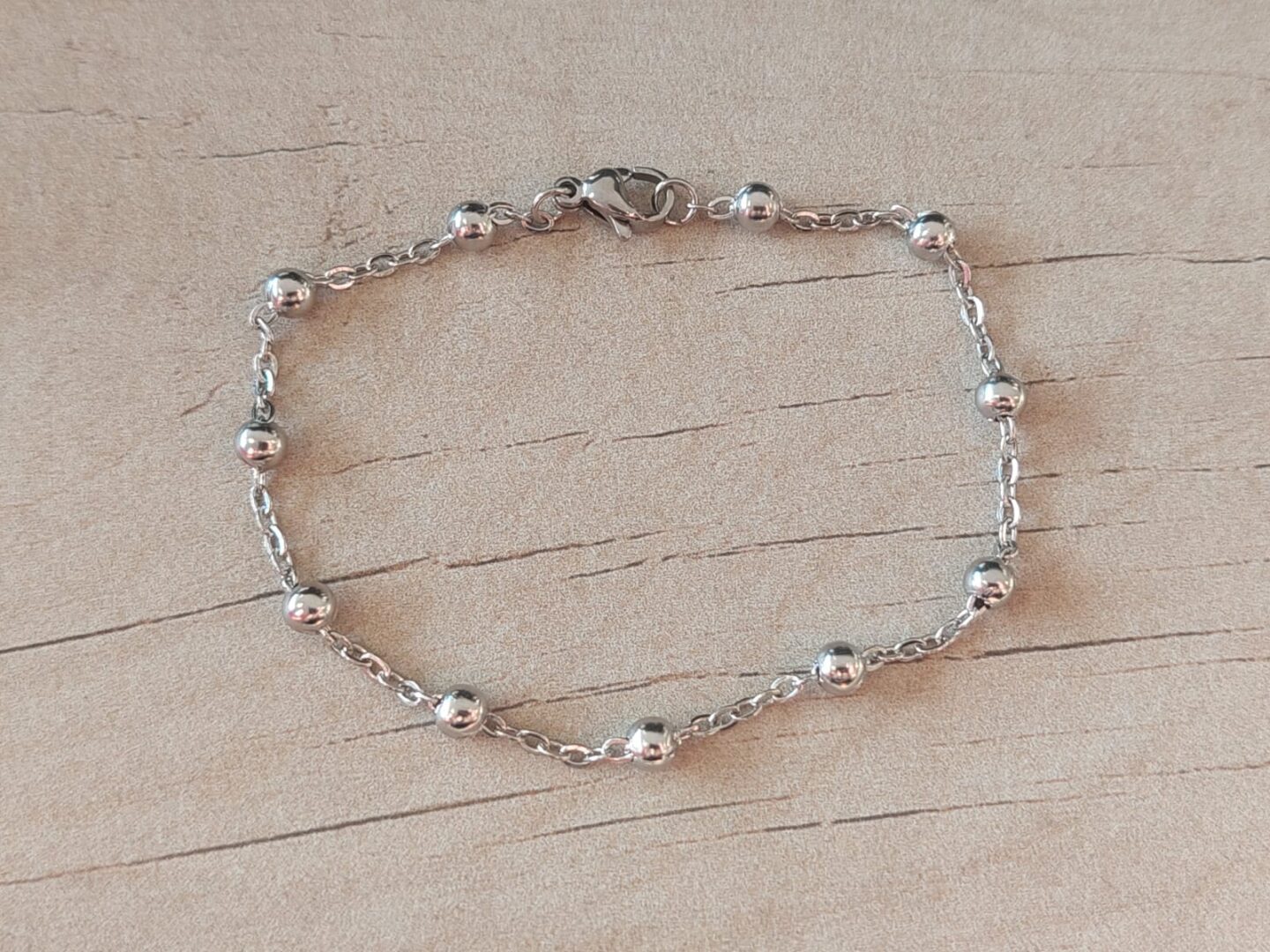 PULSERA DE ACERO ESPEJITO CON BOLITAS 3 MM. LARGO 18,5 CM