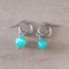 ARO DE ACERO ARGOLLA 12 MM CON DIJE OJO DE GATO VERDE COLGANTE