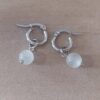 ARO DE ACERO ARGOLLA 12 MM CON DIJE OJO DE GATO BLANCO COLGANTE