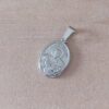 DIJE DE ACERO MEDALLA DE SAN CAYETANO OVALADA. 15 X 20 MM